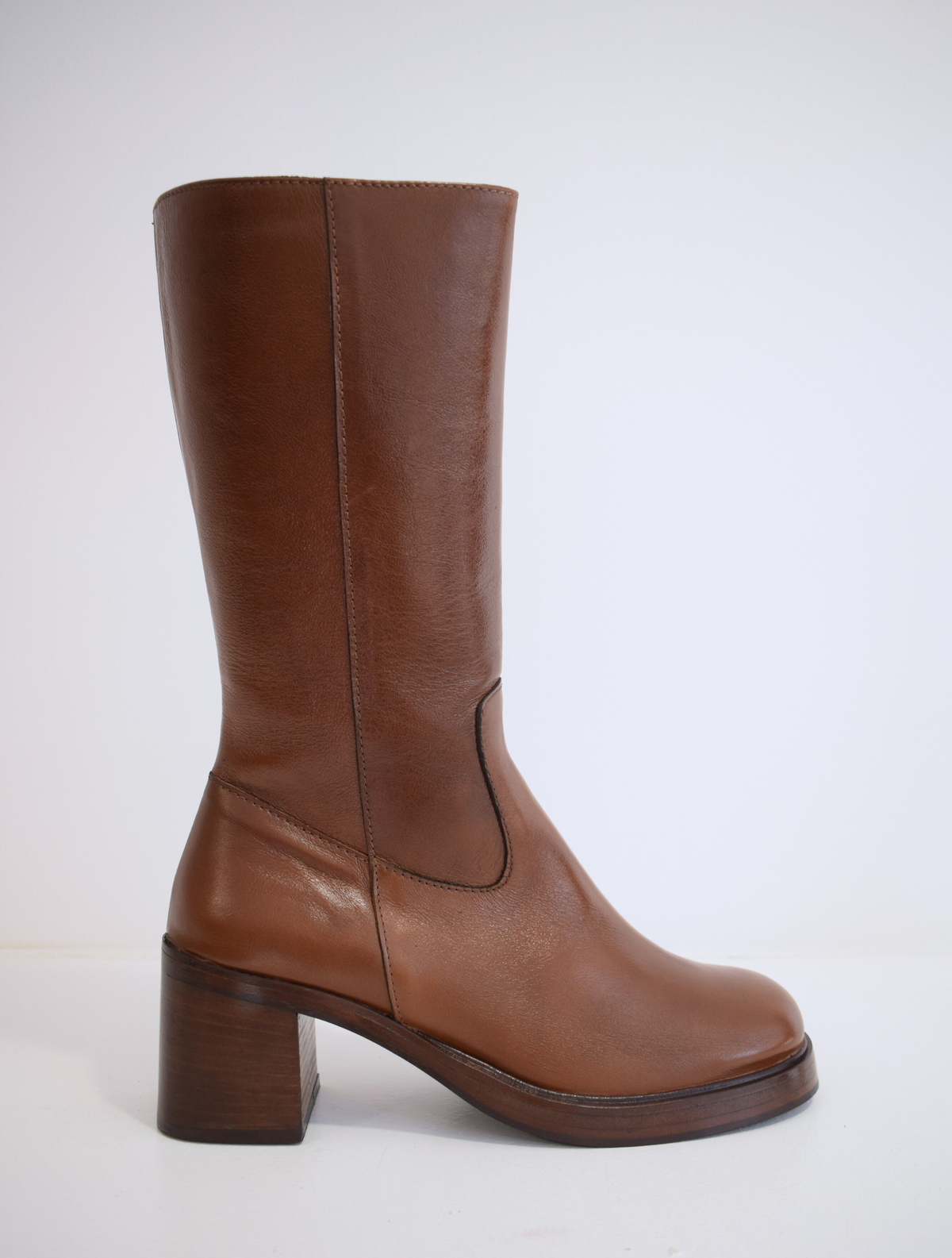 Chestnut brown medium length boot with round toe woodne block heel and wooden platform sole with inner zip fastening