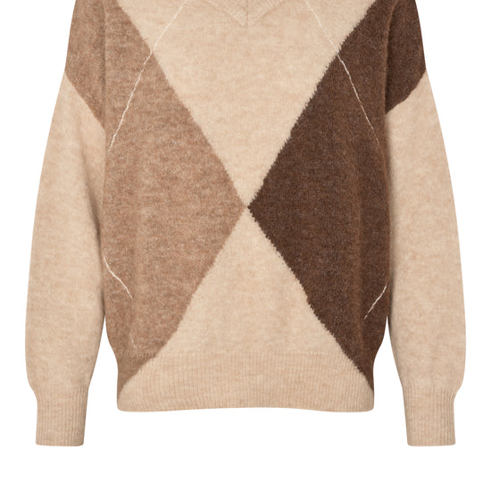 Beige and brown patterned sweater on a white background