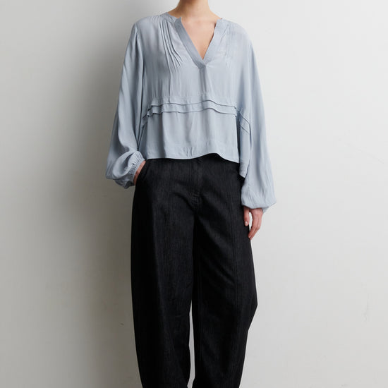 Pale grey shirt worn with black balloon trousers from Second Female