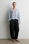 Pale grey shirt worn with black balloon trousers from Second Female