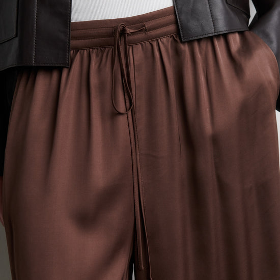 Close up detail of brown satin trousers from Second Female