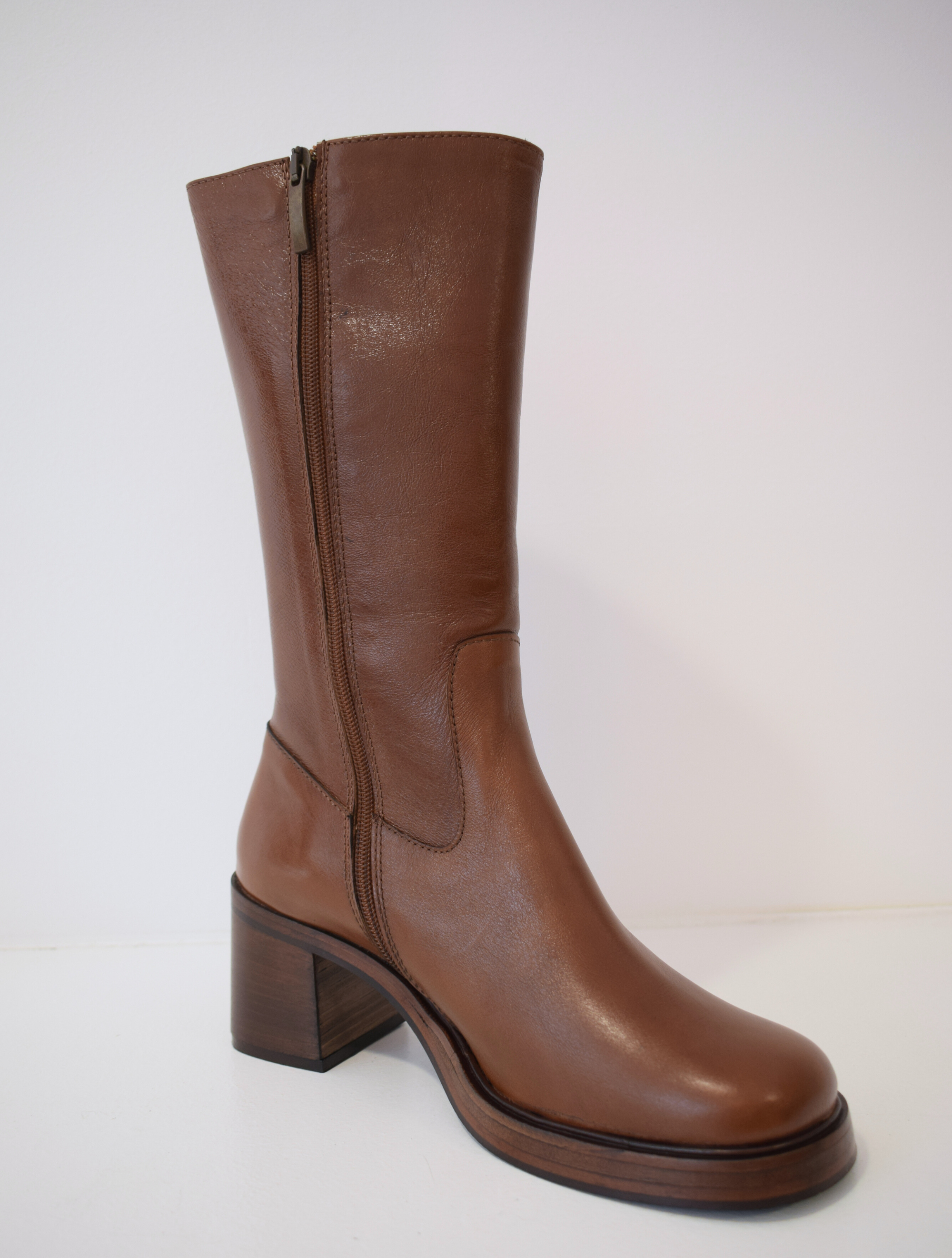 Chestnut brown medium length boot with round toe woodne block heel and wooden platform sole with inner zip fastening