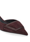A close-up of a pointed-toe flat shoe in deep burgundy suede with a dark brown leather strap detail across the front, shown on a clean white background.