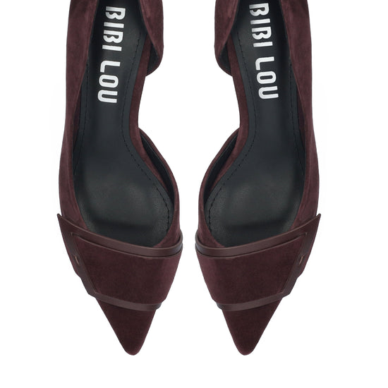A pair of pointed-toe pumps in deep burgundy suede, shown from a top-down view on a white background. The brand name 'BIBI LOU' is printed in white on the black insoles.