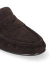 A close-up shot of a dark brown suede moccasin loafer on a clean white background.