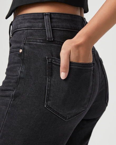 wide leg black jeans with raw hem and high waist close up