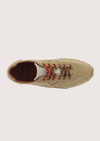 Brown suede shoe on a white background