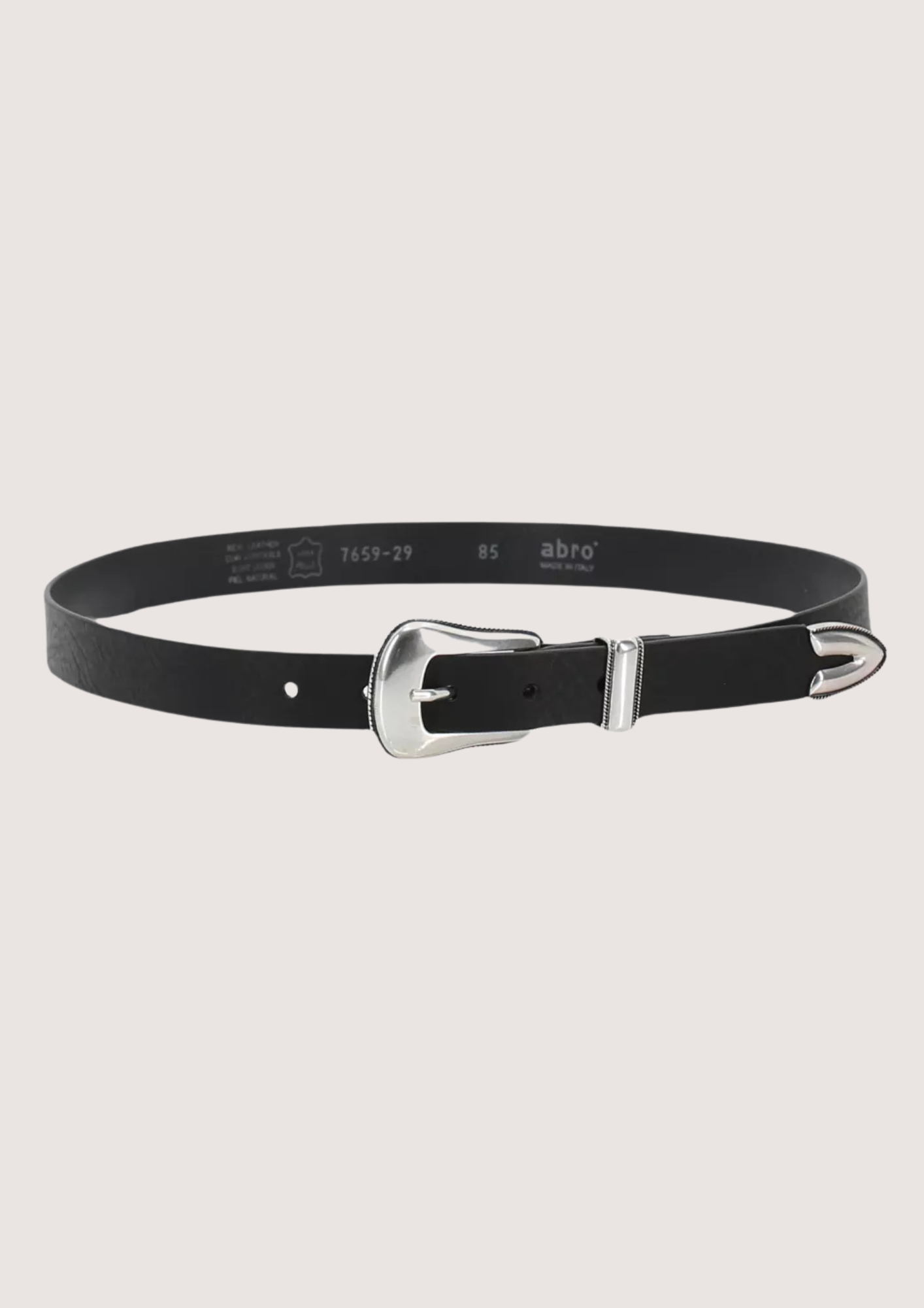 Black belt with silver buckle on a light gray background