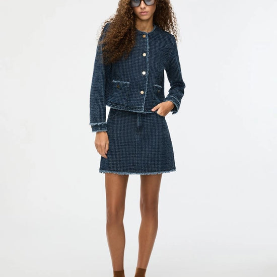 denim blue round neck jacket with gold buttons and frayed edging from iblues model shot