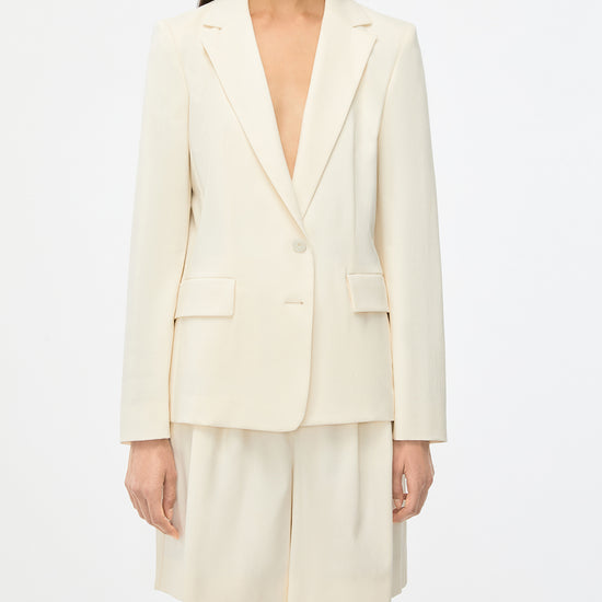 single breasted off white notch lapel blazer from iblues model