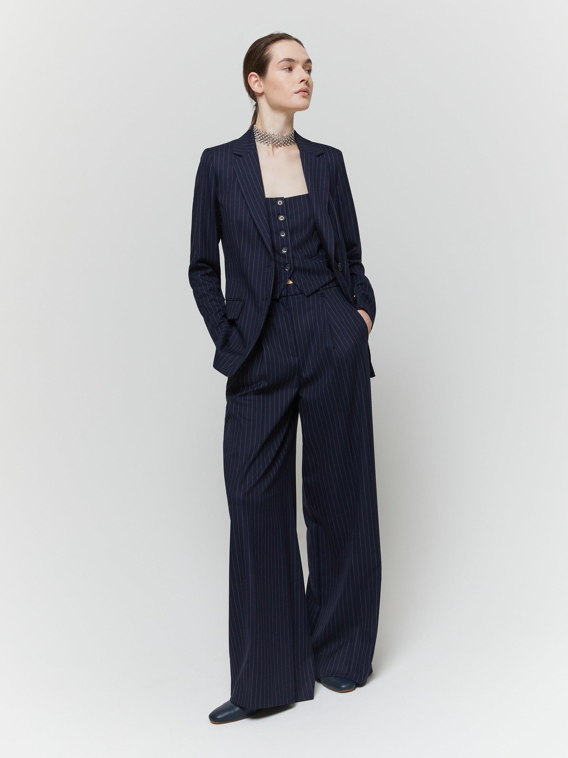 Navy blazer on moel worn with matching trousers