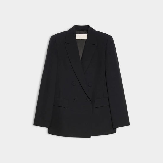 A black double-breasted blazer with notched lapels and flap pockets, displayed flat against a light gray background.