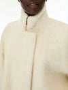 Close up of cream jacket 