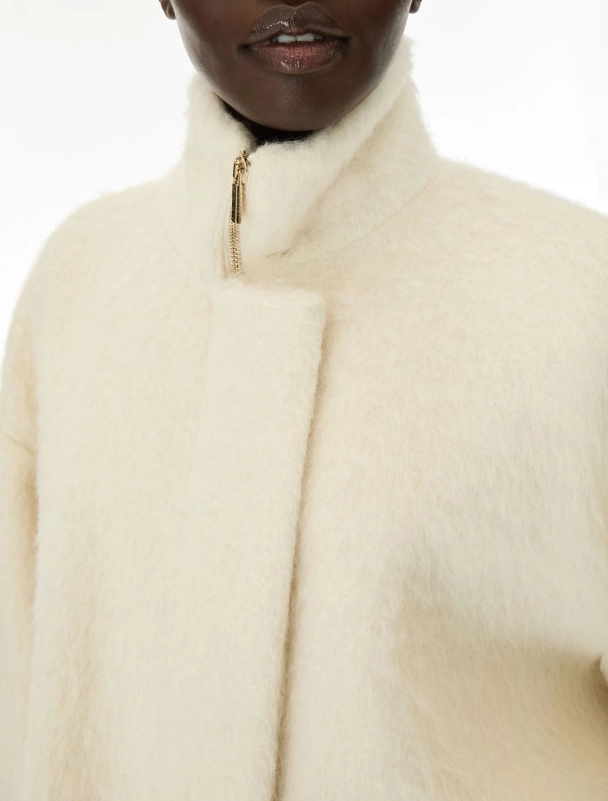 Close up of cream jacket 