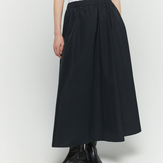 Front view of black skirt with elasticated waist