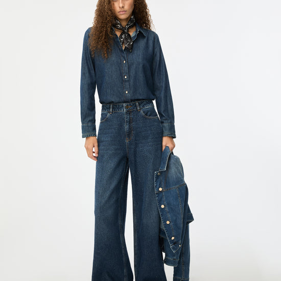 woman wearing denim shirt with wide leg jeans from Iblues