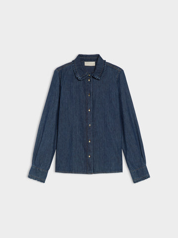 Blue denim shirt on a light gray background