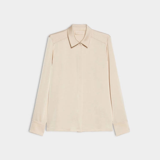 cream satin shirt on a white background