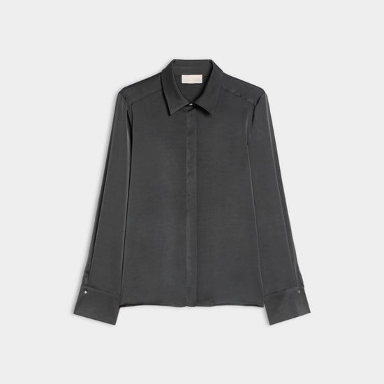 flat lay image of a grey satin shirt on a white background