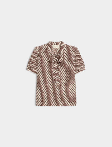 geometric blouse with neck tie on white background