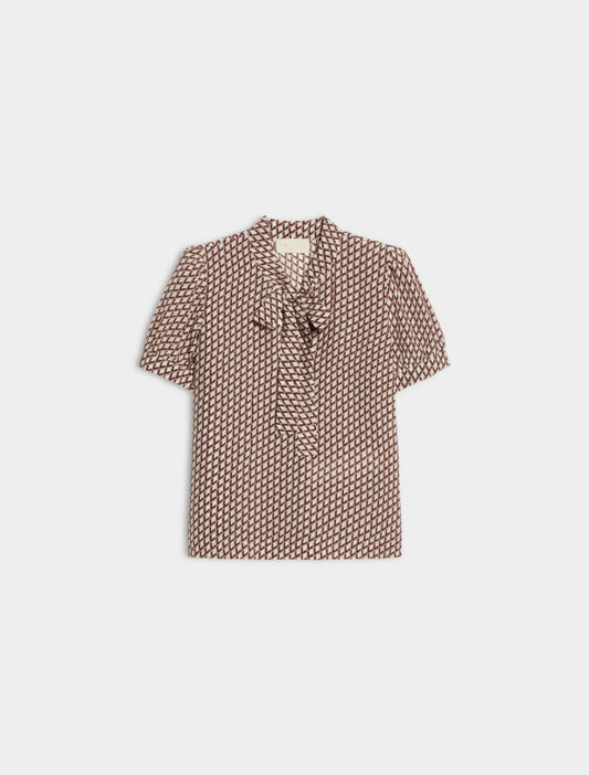 geometric blouse with neck tie on white background