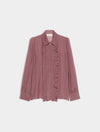 A dusty rose long-sleeve blouse with a ruffled front detail, displayed flat against a light gray background.