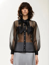 black sheer blouse with tie neck, long puffy sleeves and chest pockets model shot