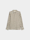 blue and brown spotted shirt on white background