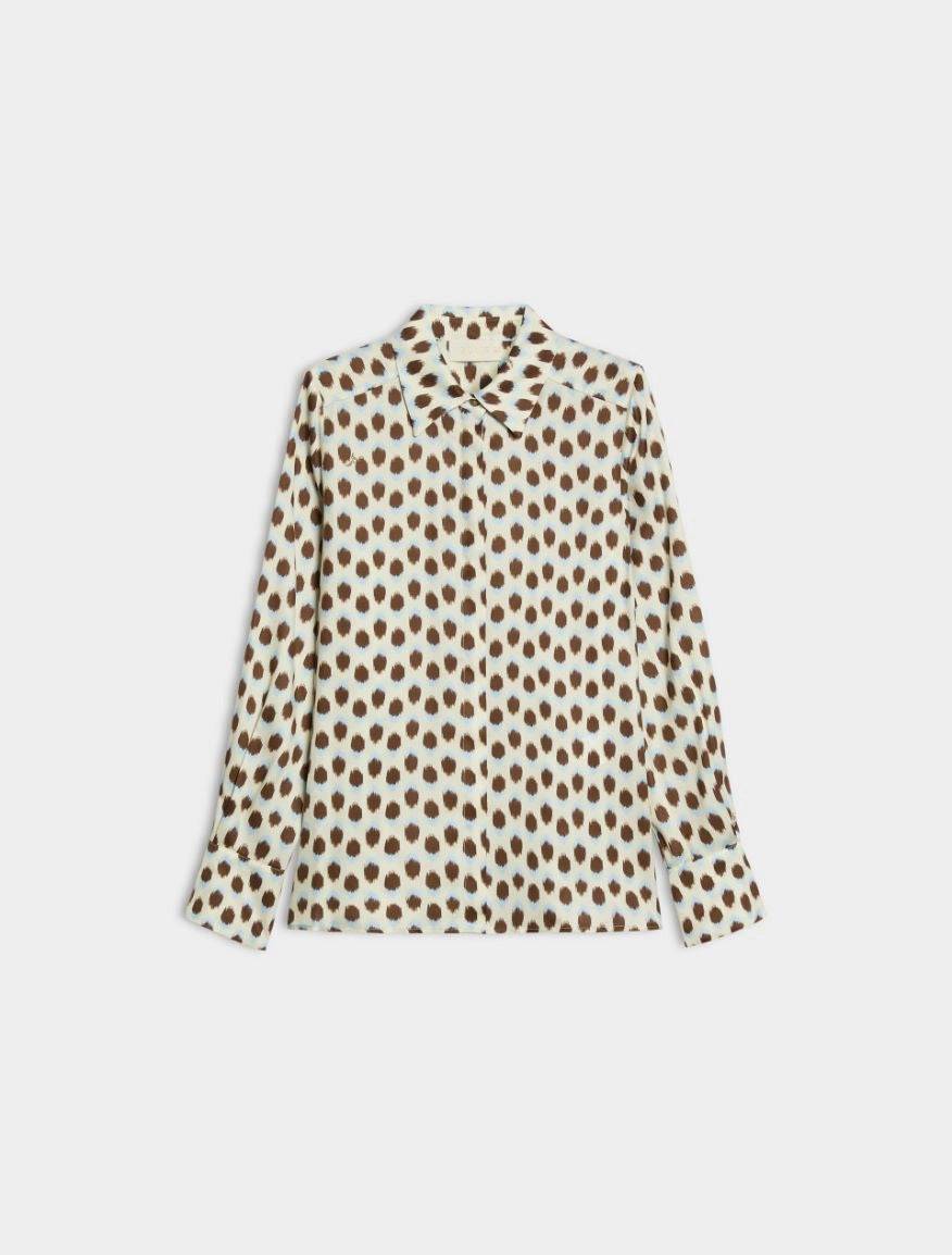 blue and brown spotted shirt on white background