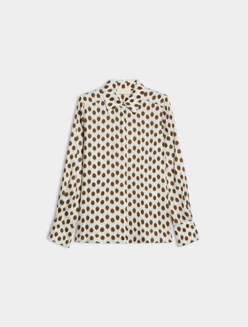 blue and brown spotted shirt on white background