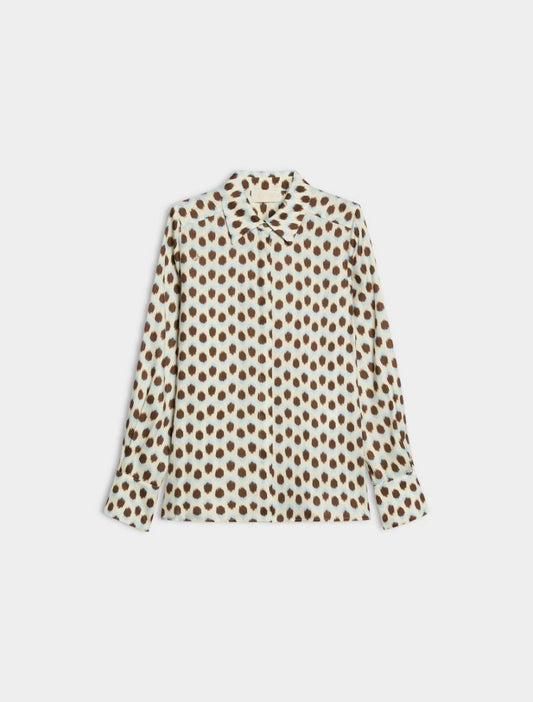blue and brown spotted shirt on white background