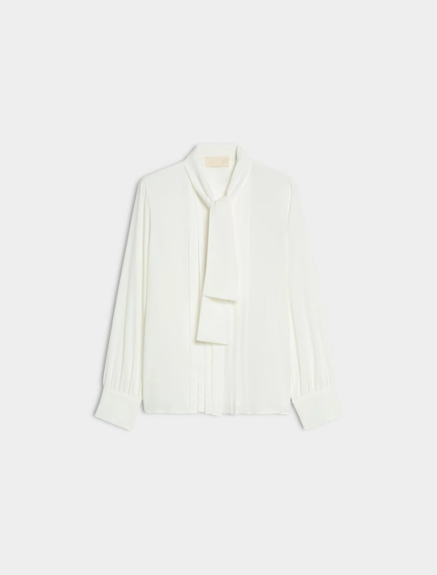white blouse with neck tie on white background