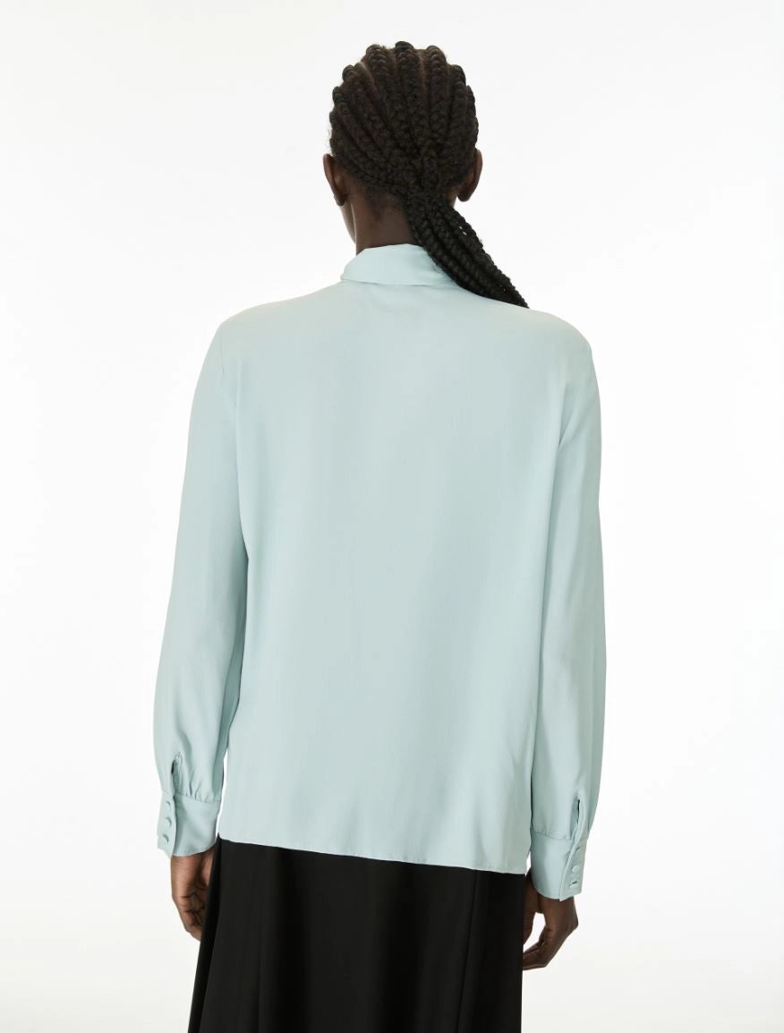 green blouse rear view