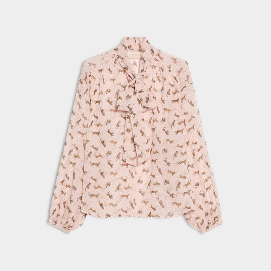 pink blouse with tigers printed on it 