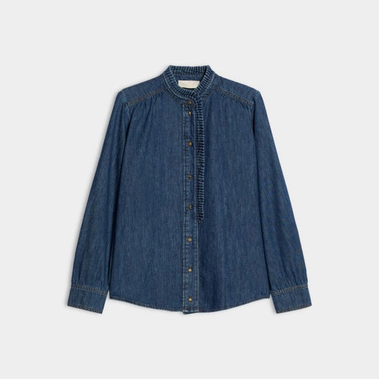 Denim shirt on white background