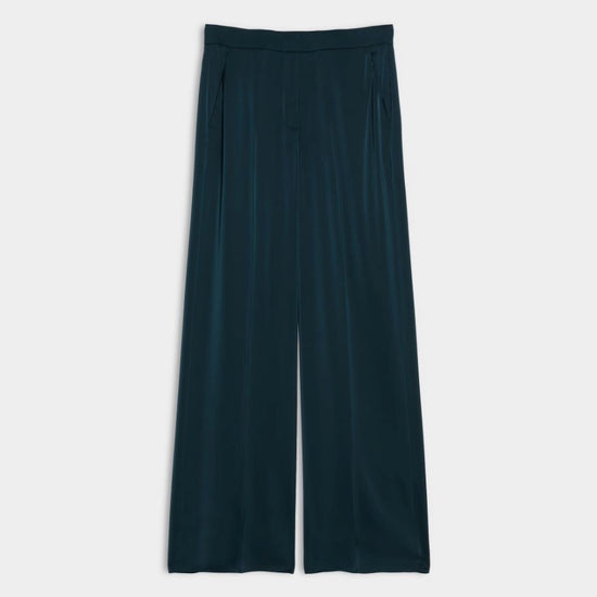 Blue satin trousers on a white background