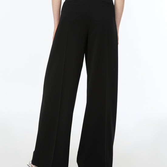 wide leg pleated trousers rear view