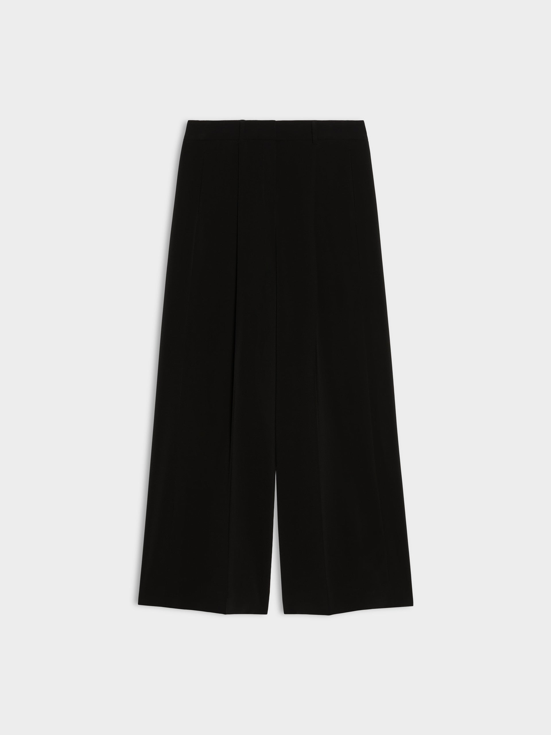 black wide leg pleated jeans on white background