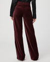 Rear view of dark velvet trousers