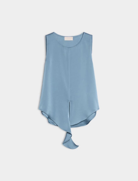 A light blue sleeveless top with a round neckline and an asymmetrical draped hem, shown flat against a light gray background.