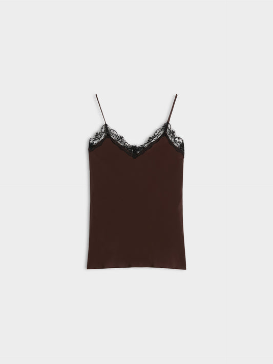 A dark brown satin camisole top with thin straps and black lace trim along the V-neckline, displayed flat against a light gray background.