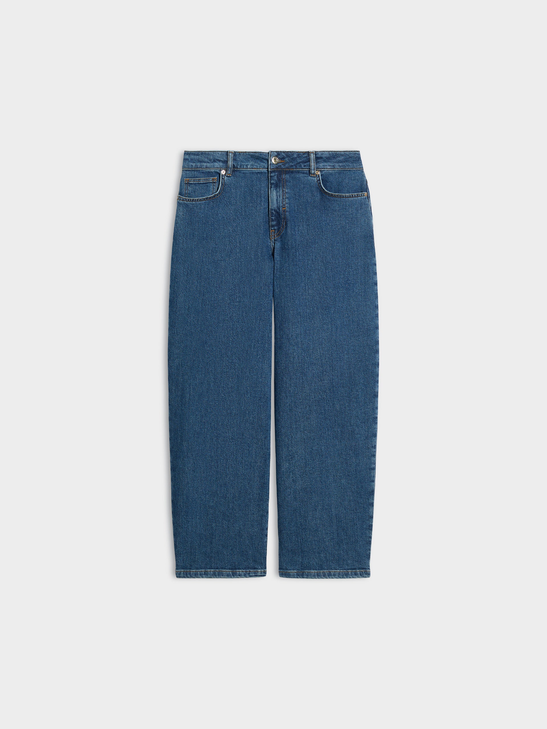 A pair of medium wash blue denim jeans shown flat against a light gray background.