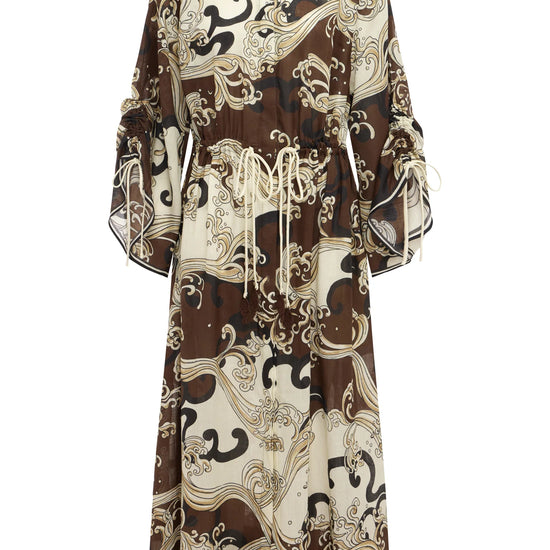 flat lay of brown pattern dress 