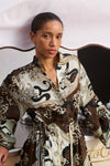 close up of model wearing brown pattern shirtdress