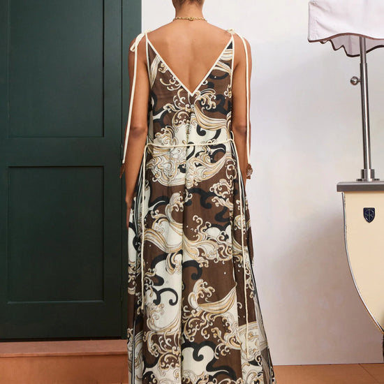 rear view of model wearing brown midi dress