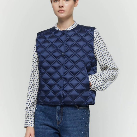 navy sleeveless quilted gilet model shot