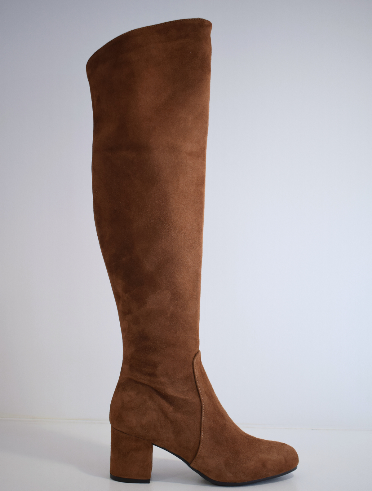 Tall brown suede boot with block heel and inside zip fastening