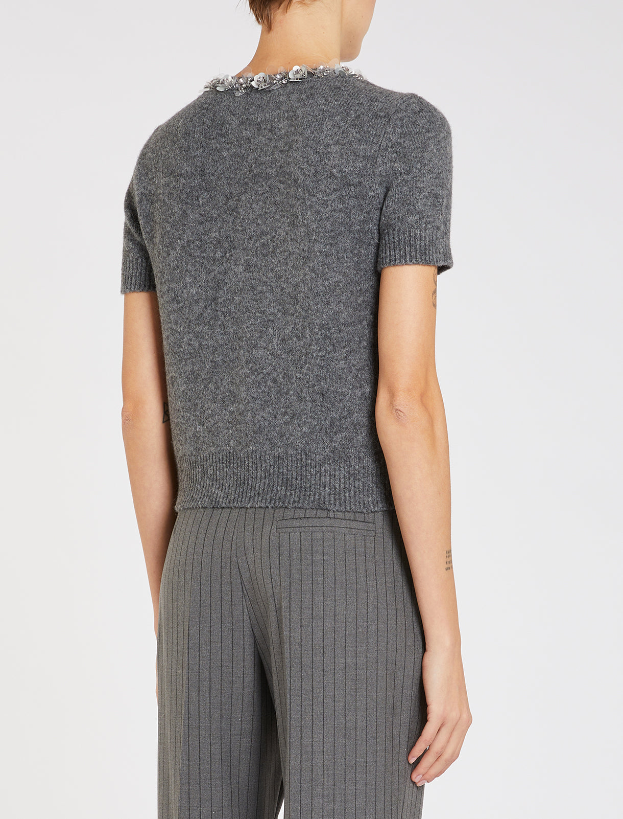 grey short sleeve knitted cardigan with jewel buttons rear view 