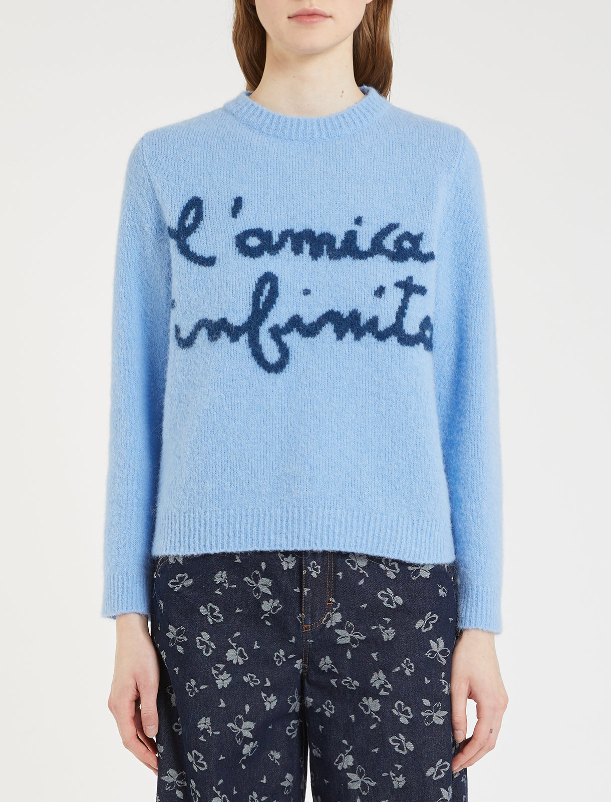 light blue wool jumper with rib detailing and wording on the front in dark blue from iblues