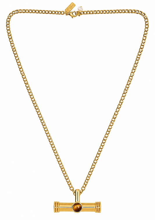 A gold-tone chain necklace with a horizontal bar pendant featuring a central round amber-brown bead, displayed on a clean white background.